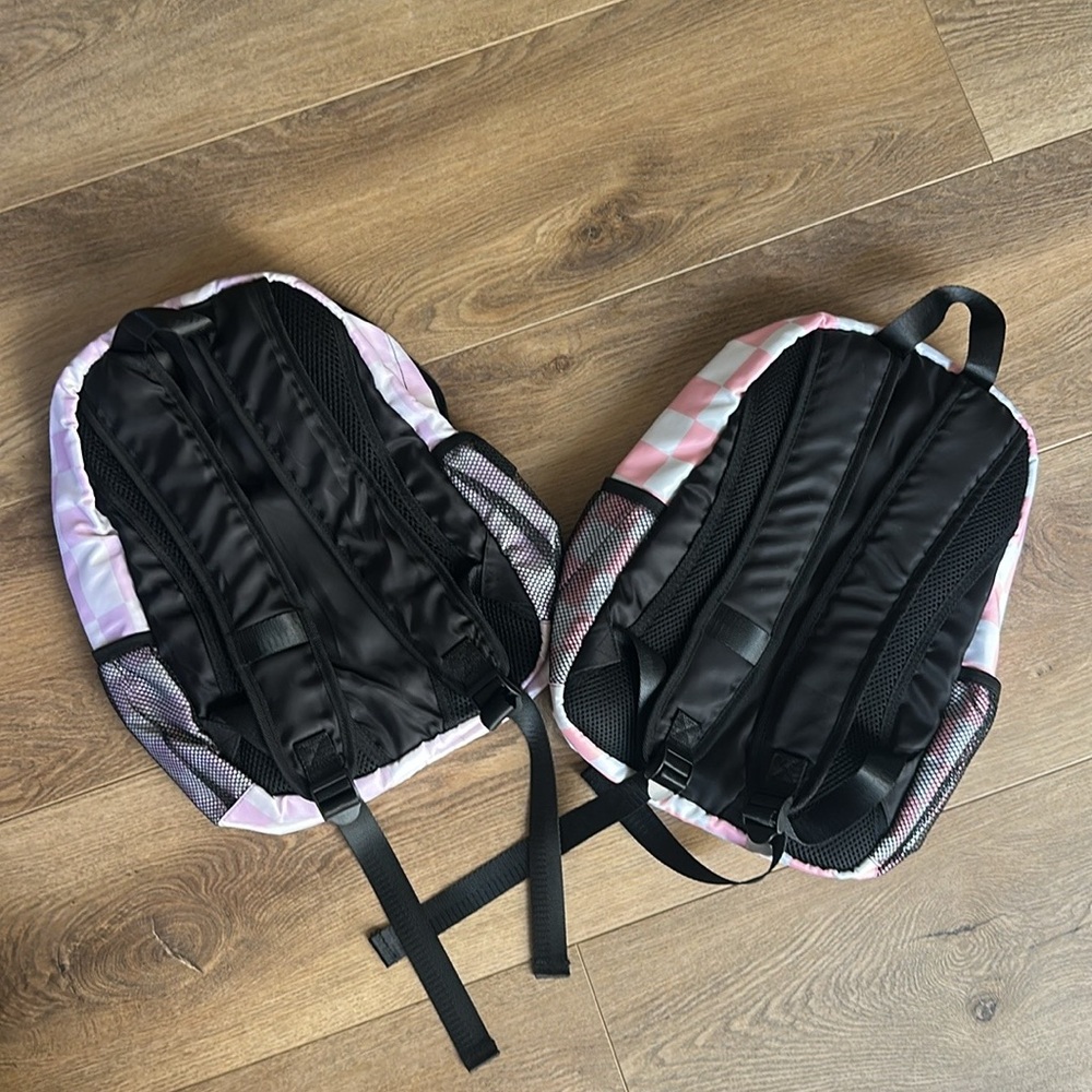 Purple/white checkerboard medium size backpack. Elementary school. Brand new.